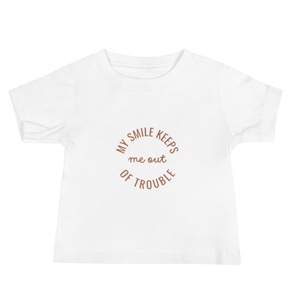 My Smile Keeps Me Out Of Trouble Baby Tee