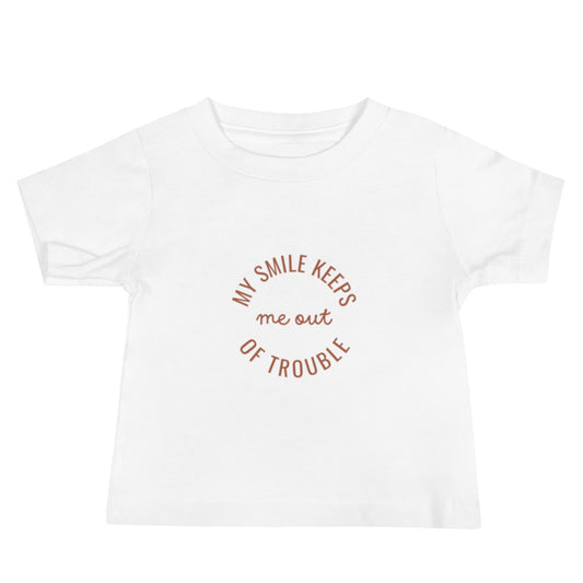 My Smile Keeps Me Out Of Trouble Baby Tee